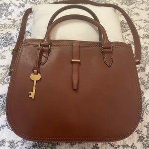 Like new Fossil purse.  Brown leather.  Only used a couple of times.